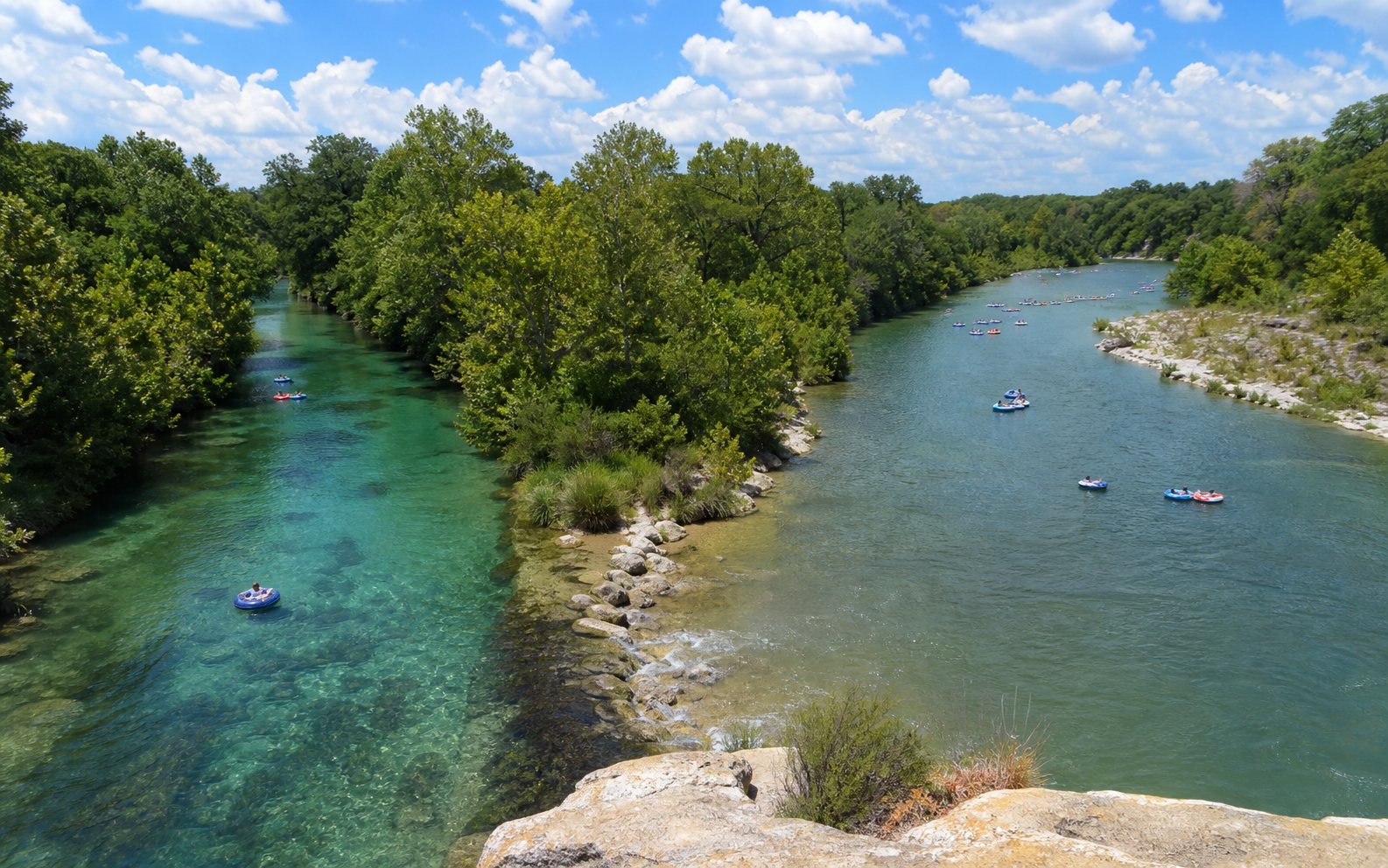 Families enjoying a free afternoon in a shaded New Braunfels public park